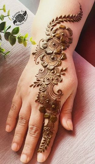 Rosette And Filigree Mehndi Designs 12