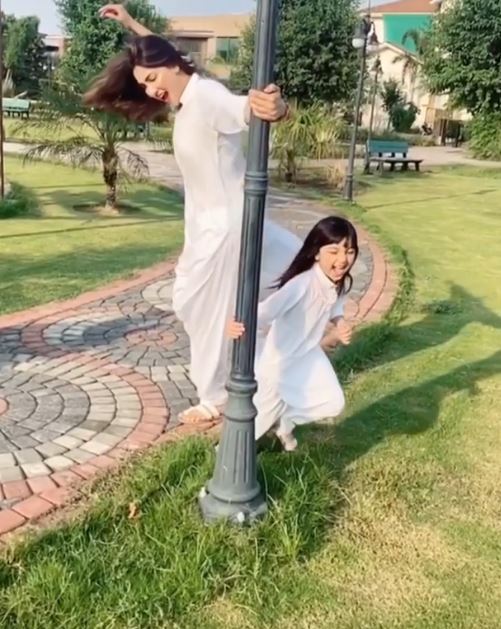 Cute Pictures of Actress Fiza Ali with her Daughter in White Dress