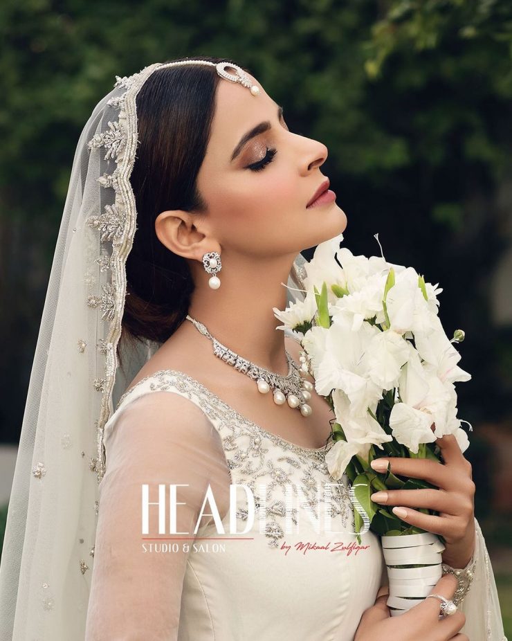 Saba Qamar Looks Drop Dead Gorgeous In Ivory Bridal Ensemble | Reviewit.pk