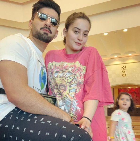 Aiman Khan And Muneeb Butt With Baby Amal In Qatar
