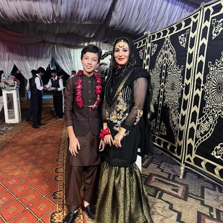 Quratulain Iqrar With Son Pehlaaj At A Wedding