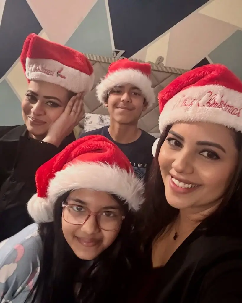 Photos of Sunita Marshall celebrating Christmas with her family