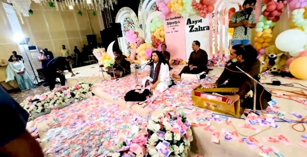 Rajab Butt’s Family Event Criticized for Lavish Cash Tossing