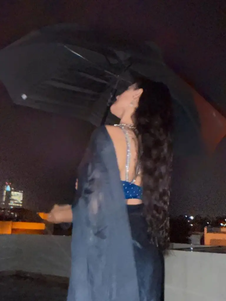 Hira Mani Criticized for Bold Saree & Caption Enjoying rain
