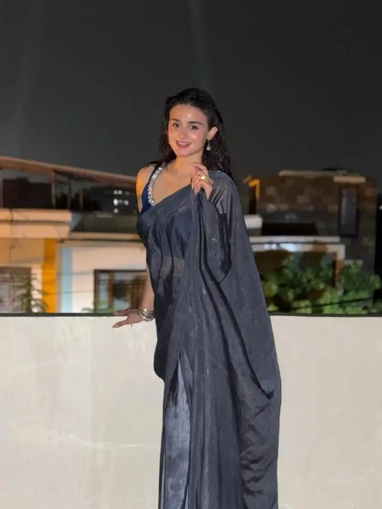 Hira Mani Criticized for Bold Saree & Caption Enjoying rain
