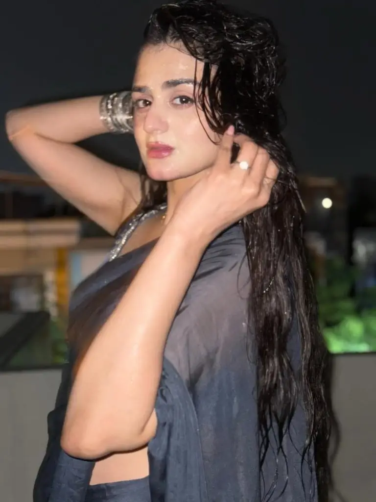 Hira Mani Criticized for Bold Saree & Caption Enjoying rain