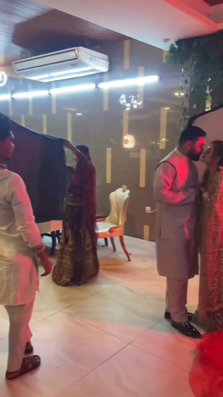 Young Couple’s Kissing Pose Ignites Social Media